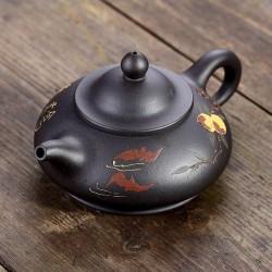 Yixing purple clay teapot...